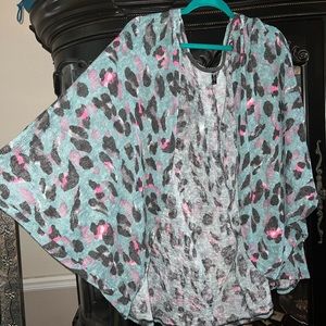 Cheetah batwing shrug.